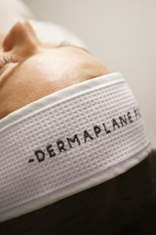 DermaplanePro headwrap in use. Measures 25.5" x 3.15" x .125"